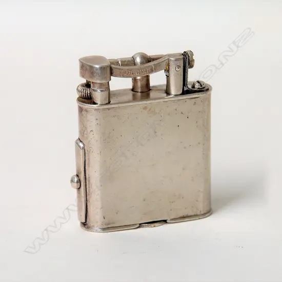 A vintage Dunhill silver plate lighter