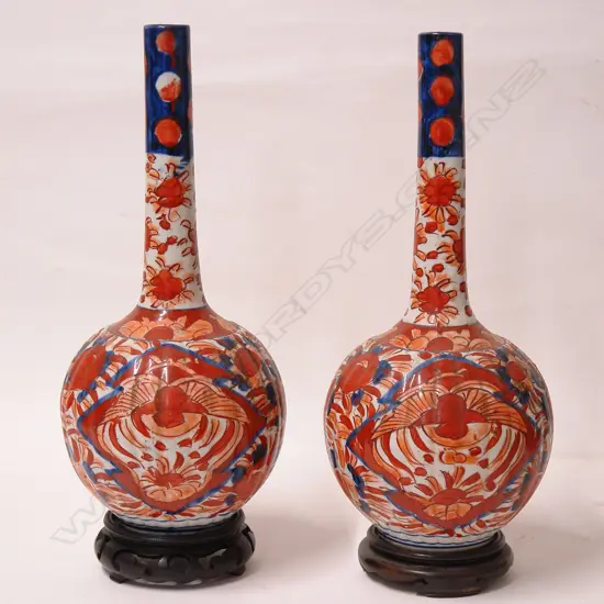 A pair of c.1900 Japanese Imari specimen vases