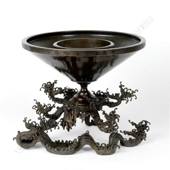A Japanese Meiji-period highly decorative bronze vase and stand