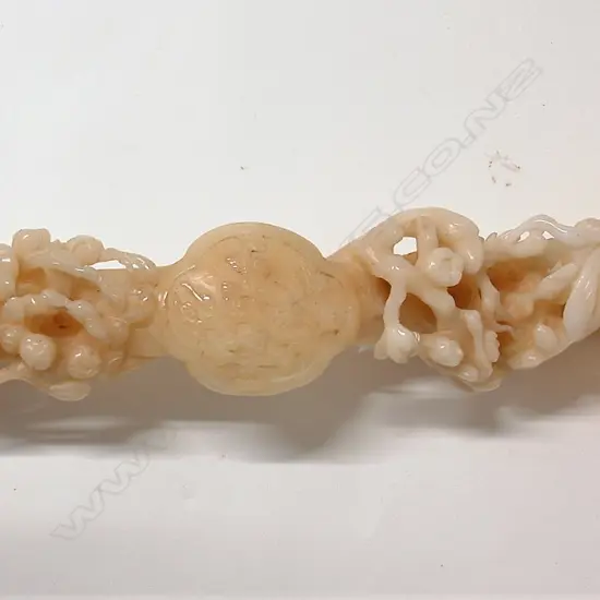 A pale jade large carved Chinese ruyi sceptre