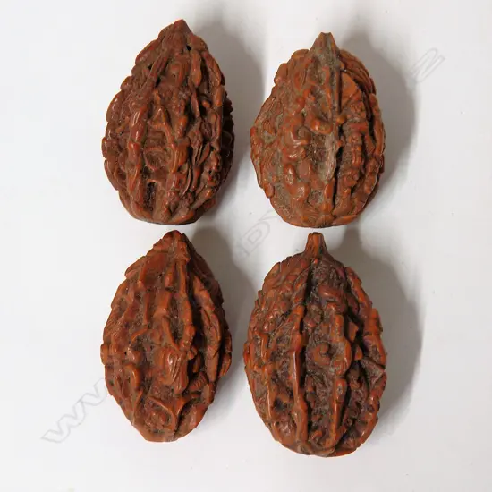 Four old Chinese finely carved walnuts