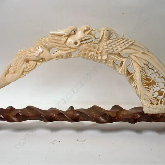 A vintage Chinese carved hippotamus tusk