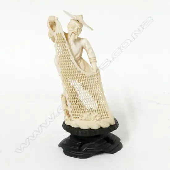 A carved Chinese ivory figurine