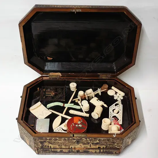 A 19thC Chinese black lacquer and gilt sewing box with carved bone fittings