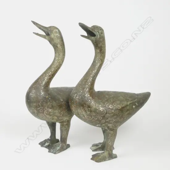 A pair of ancient-style bronze ducks