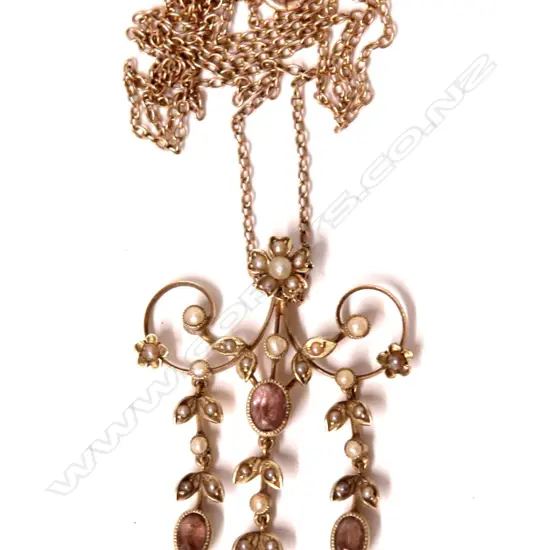 An Edwardian 9ct. yellow gold amethyst and seed pearl pendant necklace