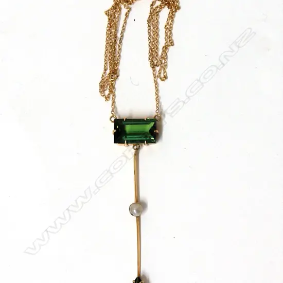 A 9ct. yellow gold green stone and seed pearl necklace