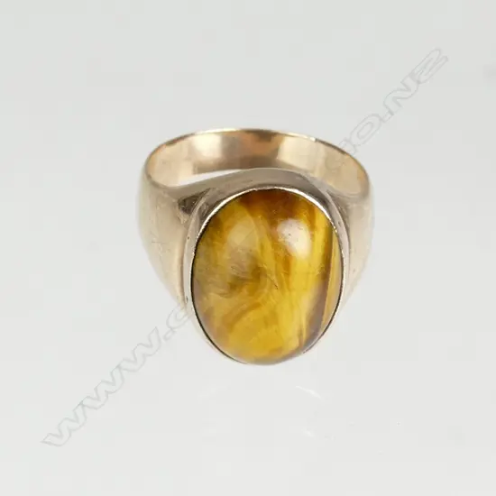 A 9ct. rose gold and tiger's eye ring