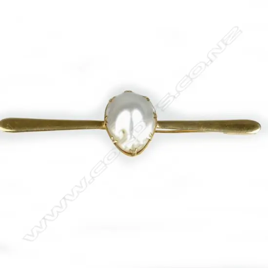 A gold and blister pearl brooch