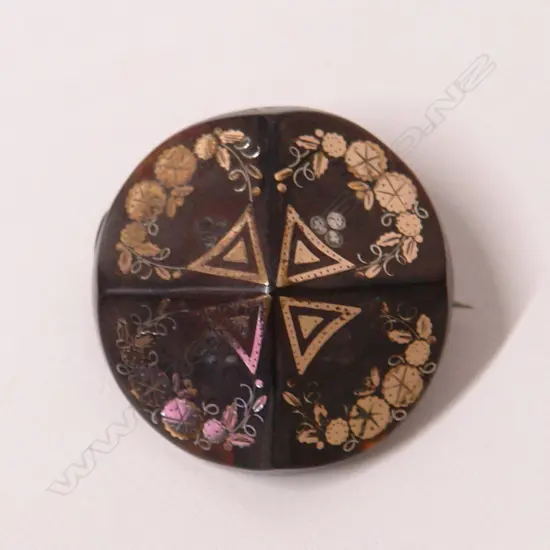 A 19thC pique gold and tortoiseshell brooch