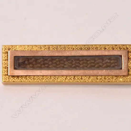 A 19thC 15ct. yellow gold mourning brooch