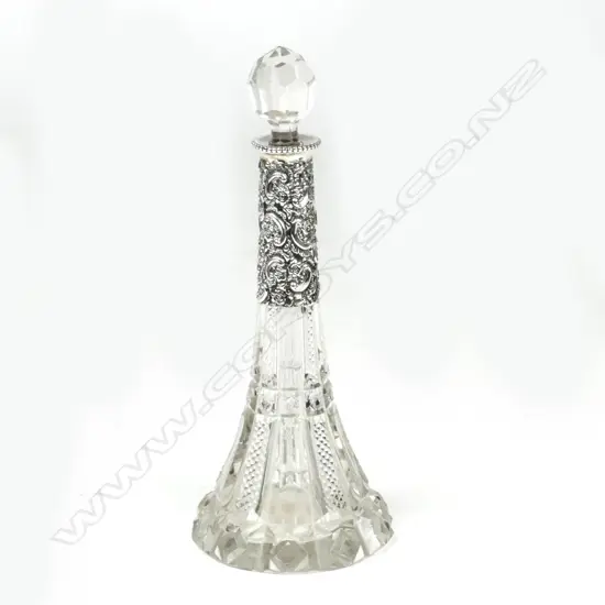 A late Victorian silver and crystal perfume bottle