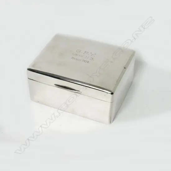 A small silver cigarette or card box