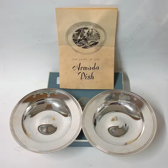 Two silver Armada dishes