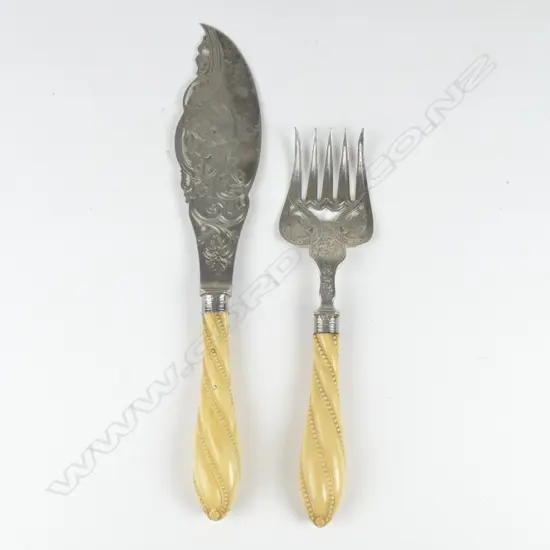 A pair of mid-Victorian silver and ivory fish servers