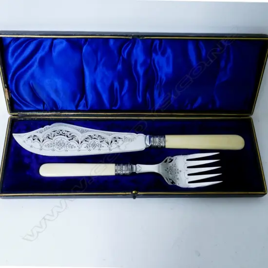 A pair of Victorian silver plated fish servers