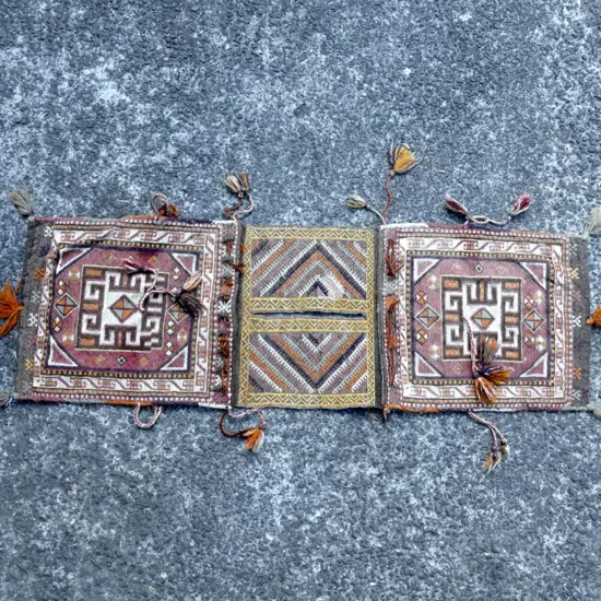 An old double-sided kilim saddlebag