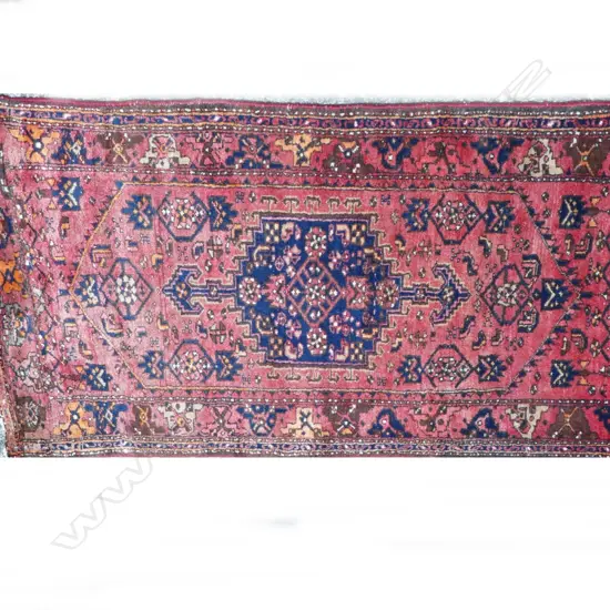 A hand knotted Persian Hamadan rug