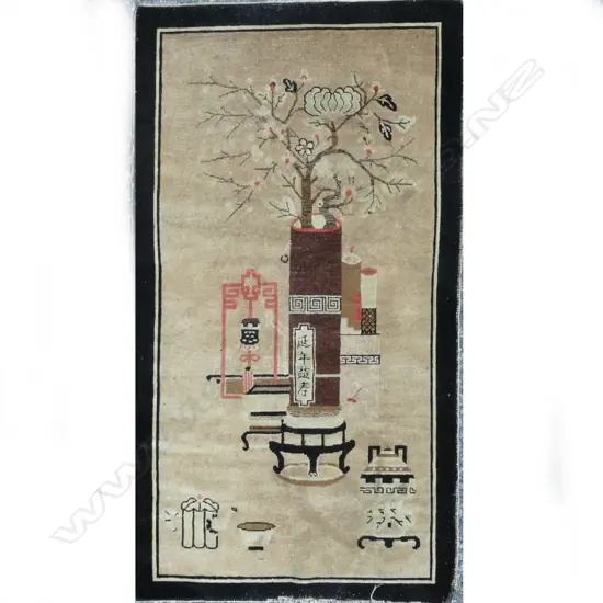 A small old handmade Chinese Art Deco all wool rug