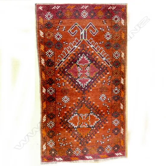 A small hand knotted Turkoman rug