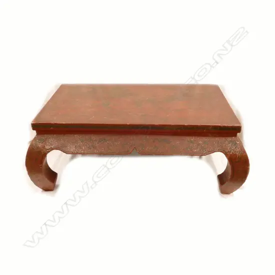 An old Chinese red lacquer low table