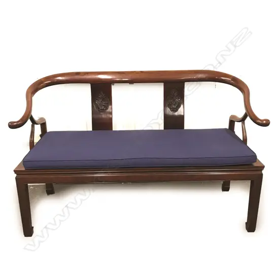 A Chinese rosewood yoke back two seater settle