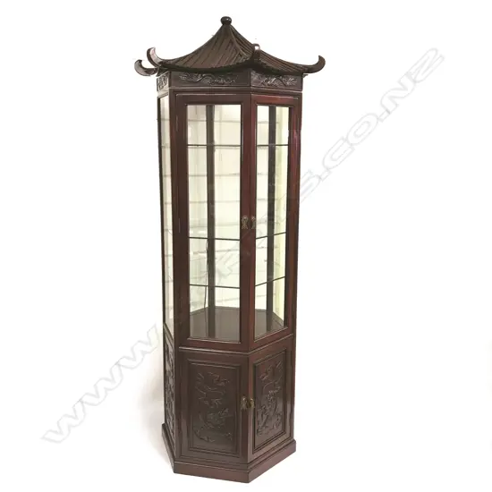 A Chinese rosewood 'pagoda' display cabinet