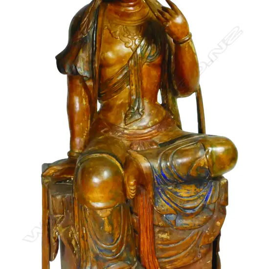 A Chinese carved wood life-size figure of Kuanyin