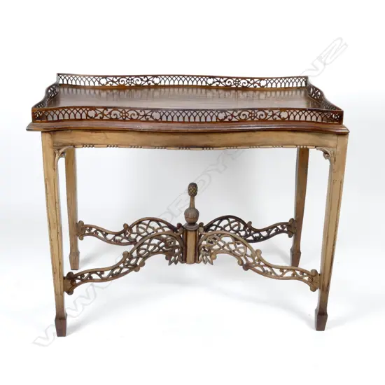 A mahogany Chippendale Revival tray top serpentine side table