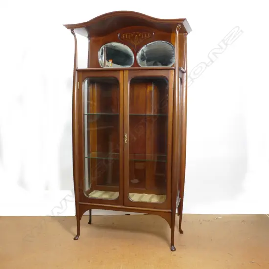 An elegant Edwardian mahogany display cabinet