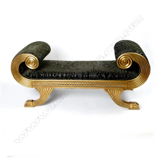 A modern decorative Egyptian Revival stool with scroll ends