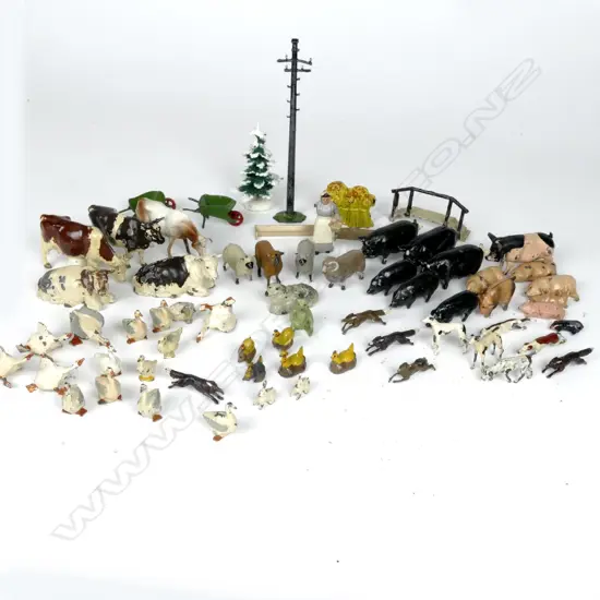 A selection of assorted vintage cast metal farm animals