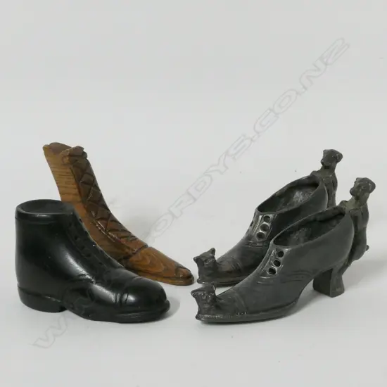 A pair of Victorian pewter pin cushion shoes