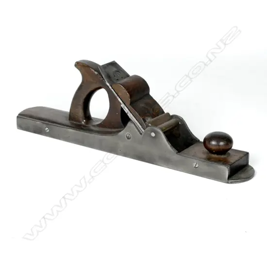 A craftsman made 16" mahogany infill joining plane