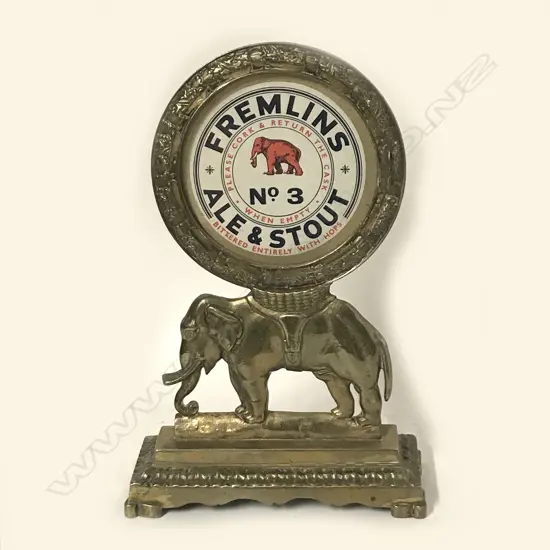 A 19thC brass Fremlin's Brewery bar top advertising mascot
