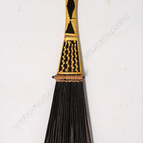 A fine Malaita (Solomon Islands) man's woven comb (FAA)