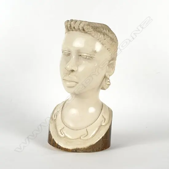 A carved ivory head