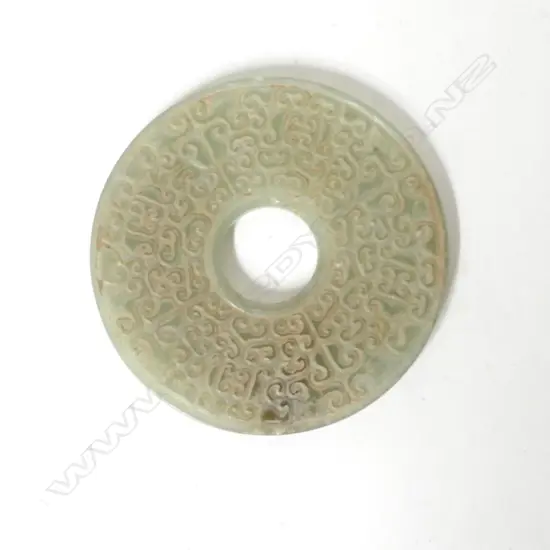 A Chinese jade bi disc