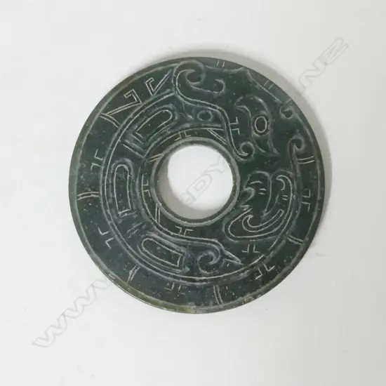 A Chinese jade bi disc