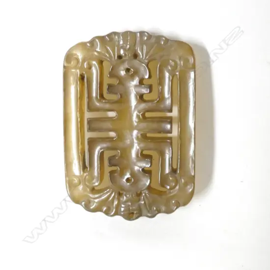 A Chinese brown jade tablet pendant