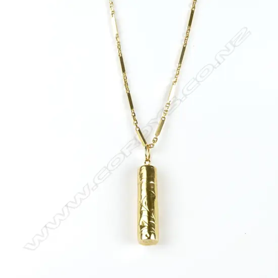 An 18ct. gold chain and pendant