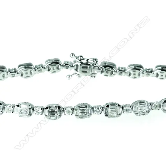 A lady's impressive 18ct. white gold and diamond tennis bracelet