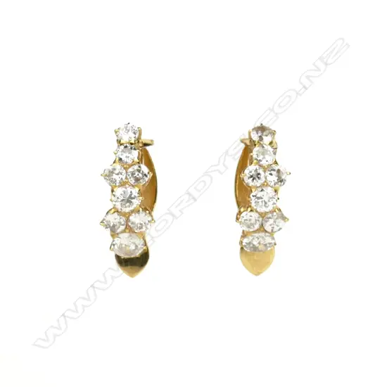 A pair of 18ct. gold and diamond earrings