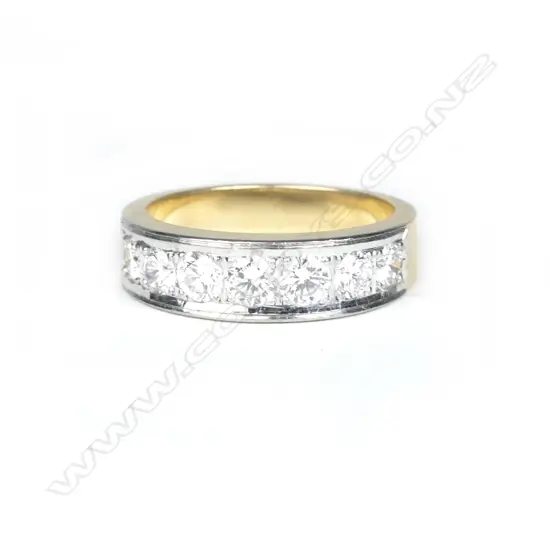 An 18ct. gold and diamond ring