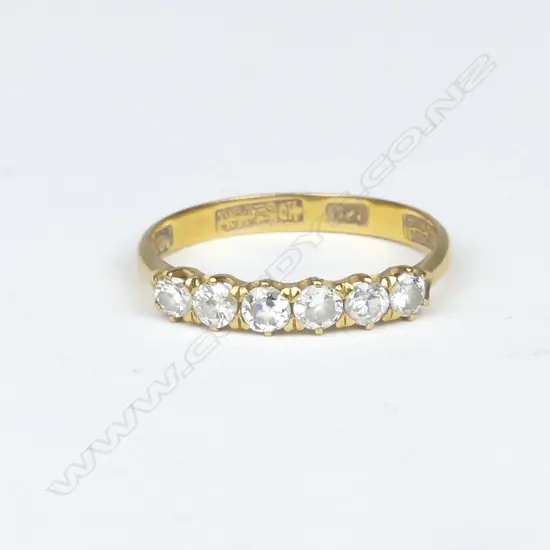 A 22ct. gold and diamond band