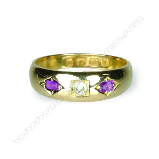 An 18ct. ruby and diamond gypsy ring