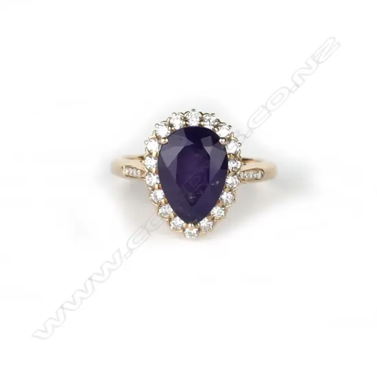 An 18ct. rose gold amethyst and diamond ring