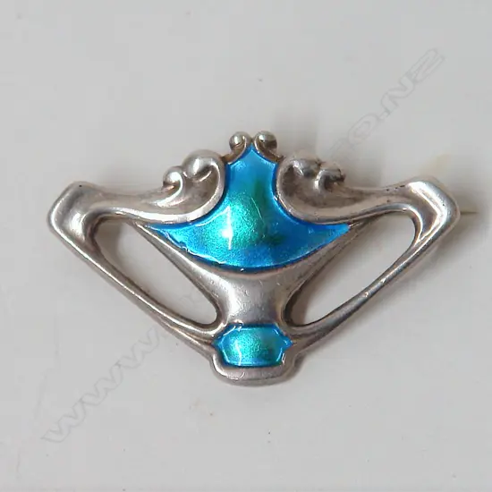 An Art Nouveau Charles Horner silver and enamelled brooch