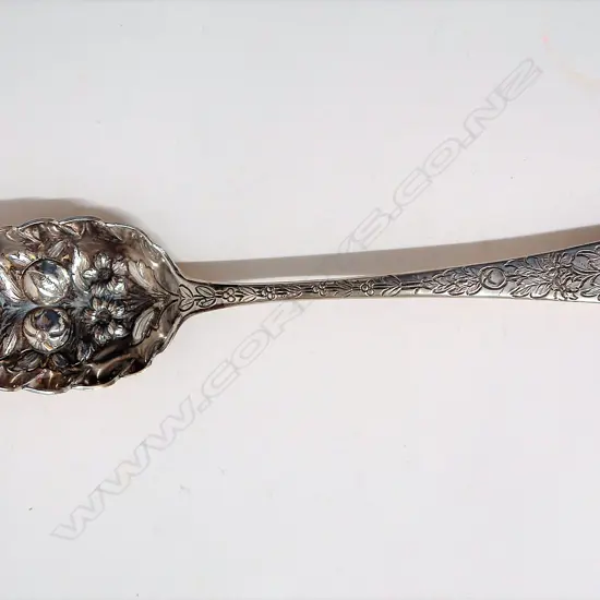 A George III silver berry spoon