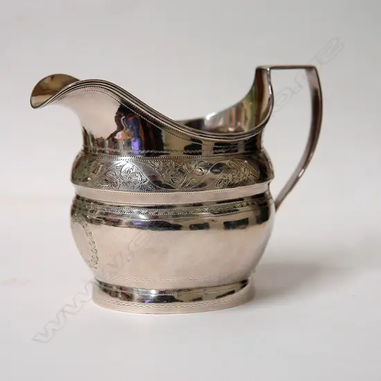 A George II helmet form cream jug